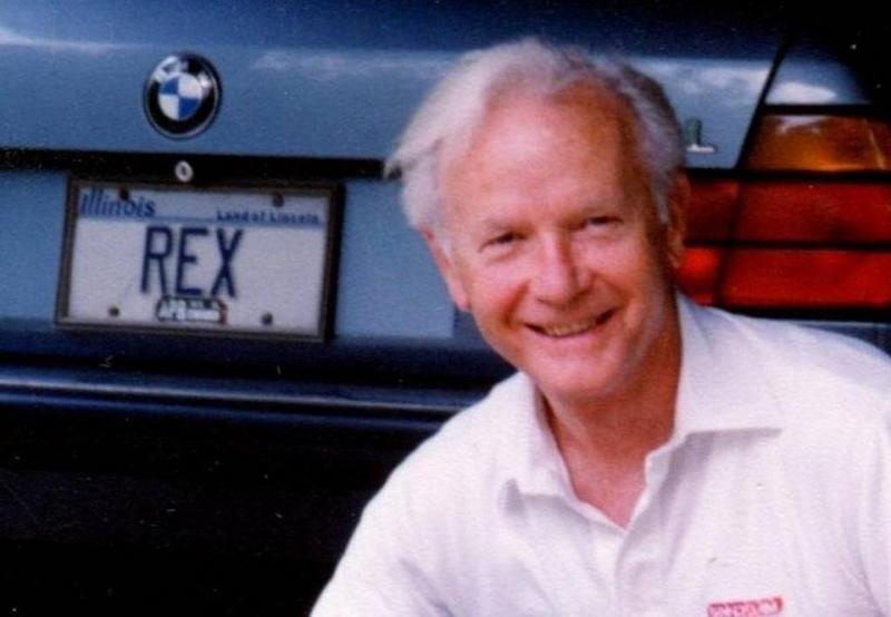 Belleville attorney Rex Carr with his Rex car. 