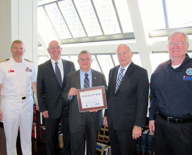 From left, Captain Mark Hunzeker, USN (Legal Service Office, Great Lakes); Joseph R. Marconi (Chair, Business Litigation Group, Johnson & Bell), Renato "Ron" Bacci (Illinois Committee for ESGR); William V. Johnson (Founding Partner, Johnson & Bell), Frank M. Grenard (ESGR Volunteer and Chair, Commercial Transactions Group, Johnson & Bell) at presentation of Seven Seals Award on June 3.