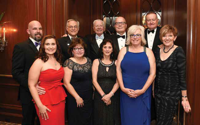 Season's greetings from the IBSA leadership, pictured at the Illinois Bar Foundation Gala held at Chicago's Four Seasons Hotel on Oct. 19. From left to right: Eric Hanis, Third Vice President Anna Krolikowska, Second Vice President Dennis Orsey, Cathy Orsey, President-elect David Sosin, Janet Sosin, President James McCluskey, Janice Anderson, Immediate Past President Russell Hartigan, Sue Hartigan.