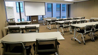 Conference Room B with tables and chairs organized in rows