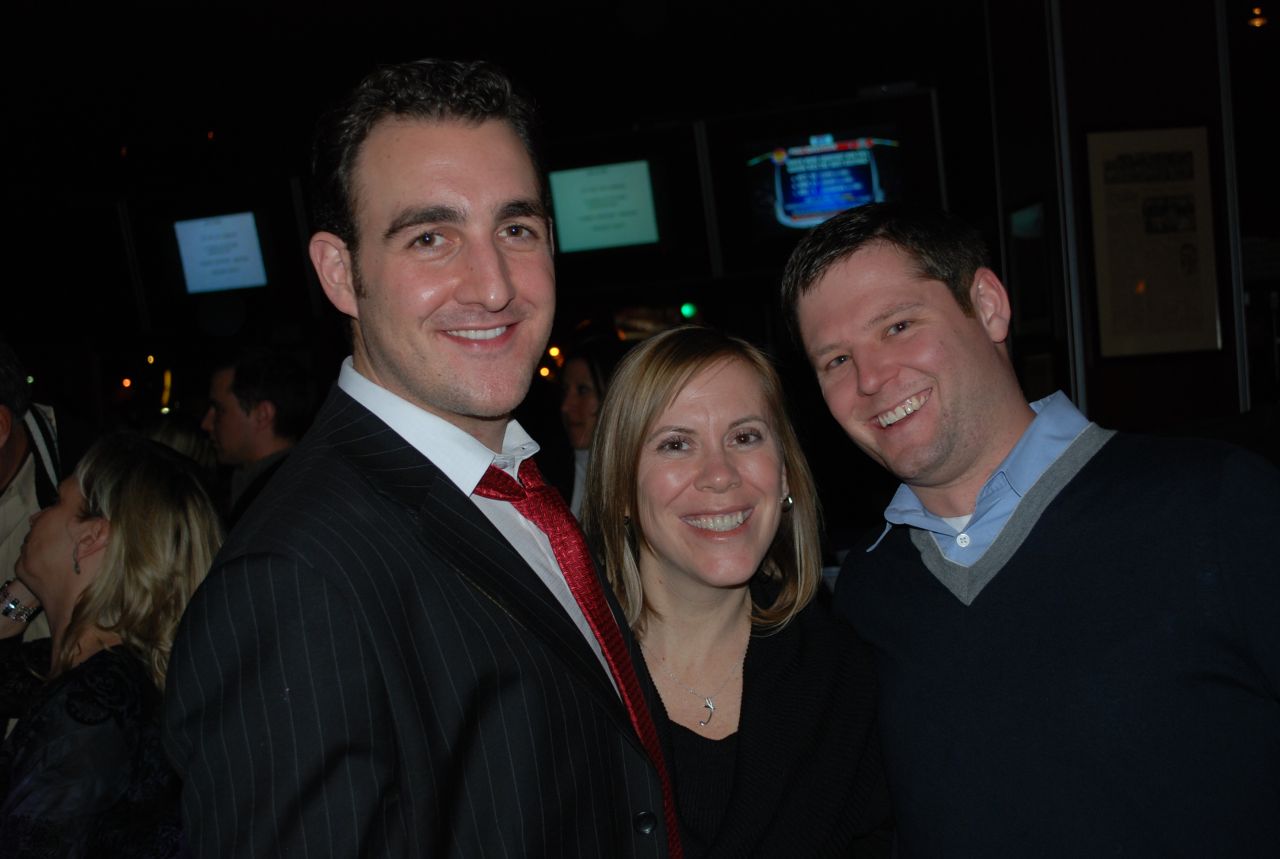 Christopher Niro entertains two guests.