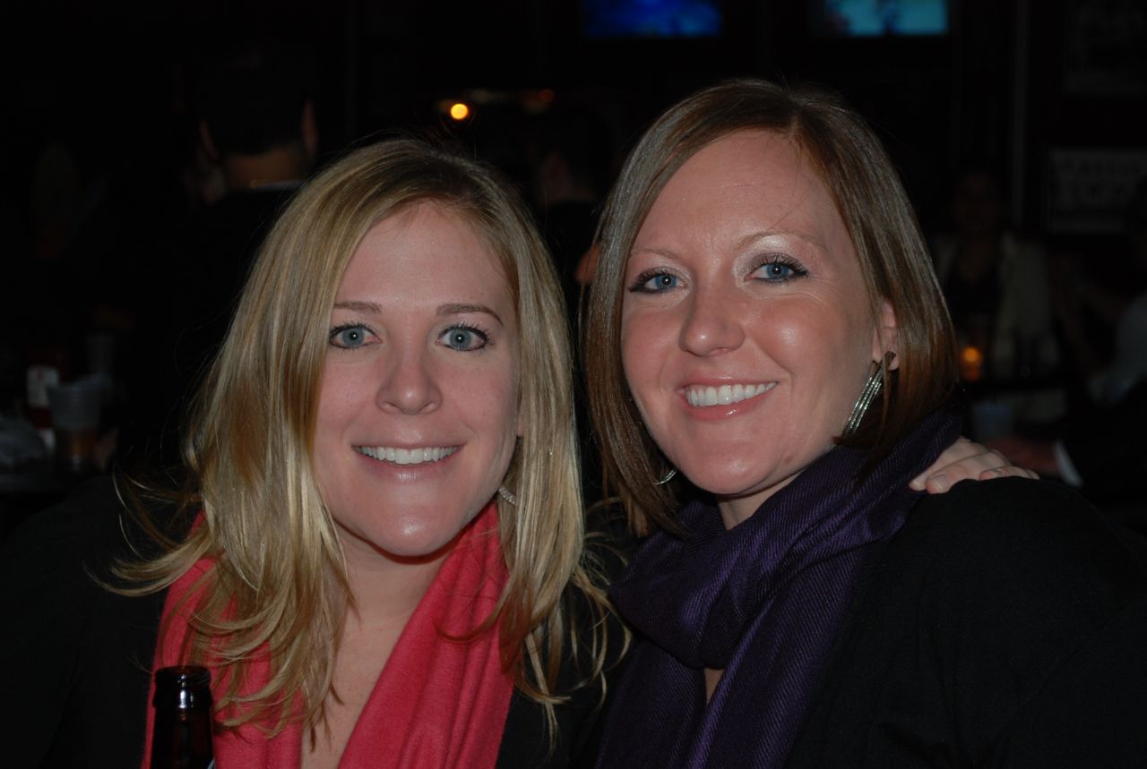 Two guests enjoy the party.