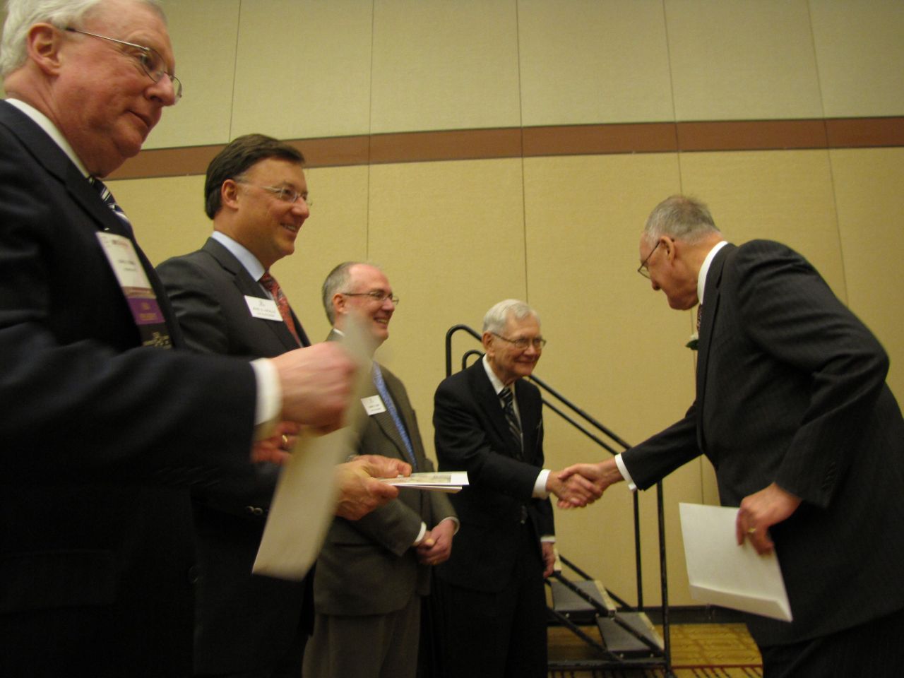 Former Gov. Jim Thompson receives his certificate as a member of the 1959 Class of Senior Counsellors.