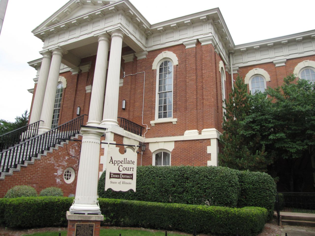 The building sits at 1004 Columbus, across from Washington Park.