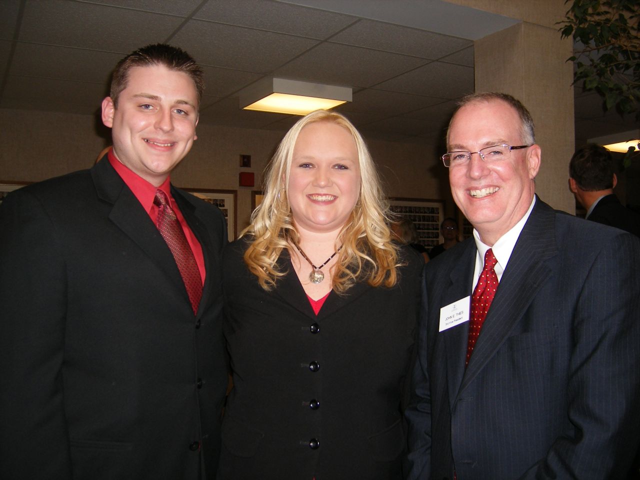 New Admittee Cortney Kuntze (center) with her husband, Paul (left), and ISBA 3rd Vice President Thies