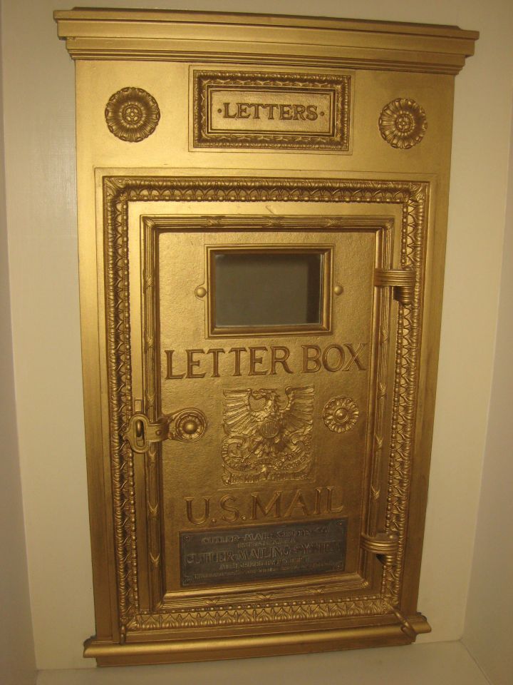 Post office letter box in Elmore & Reid hallway