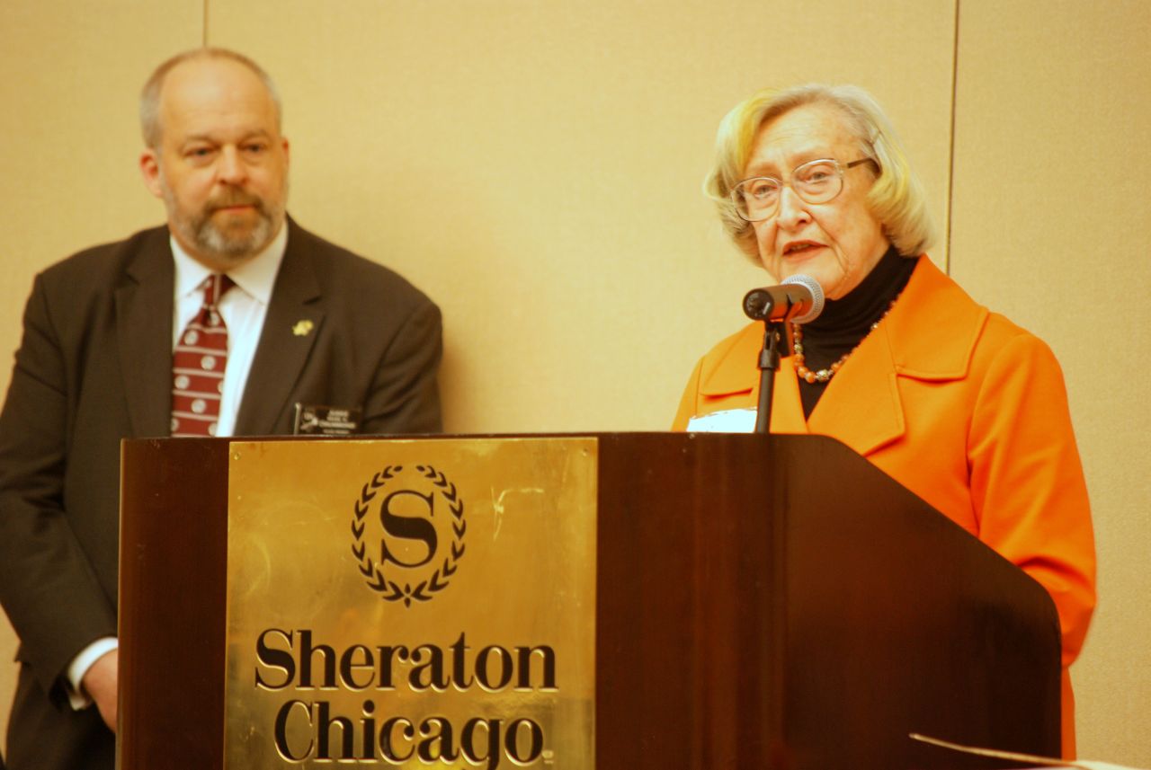 Dawn Clark Netsch presents the American Judicature Society's Special Merit Citation to Judge Mark A. Drummond, who accepted the award for the 7 Reasons to Leave the Party Program.