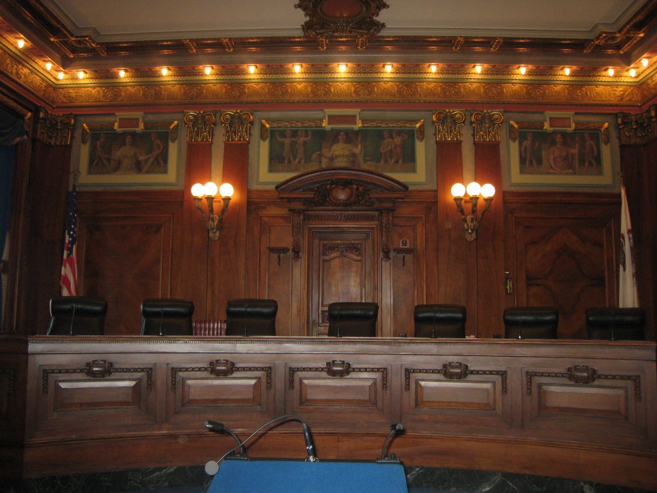 The seven Illinois Supreme Court justices preside in this courtroom