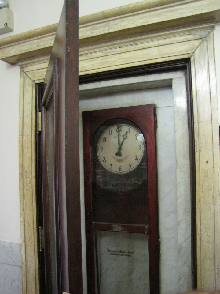 Antique wall clock on the first floor