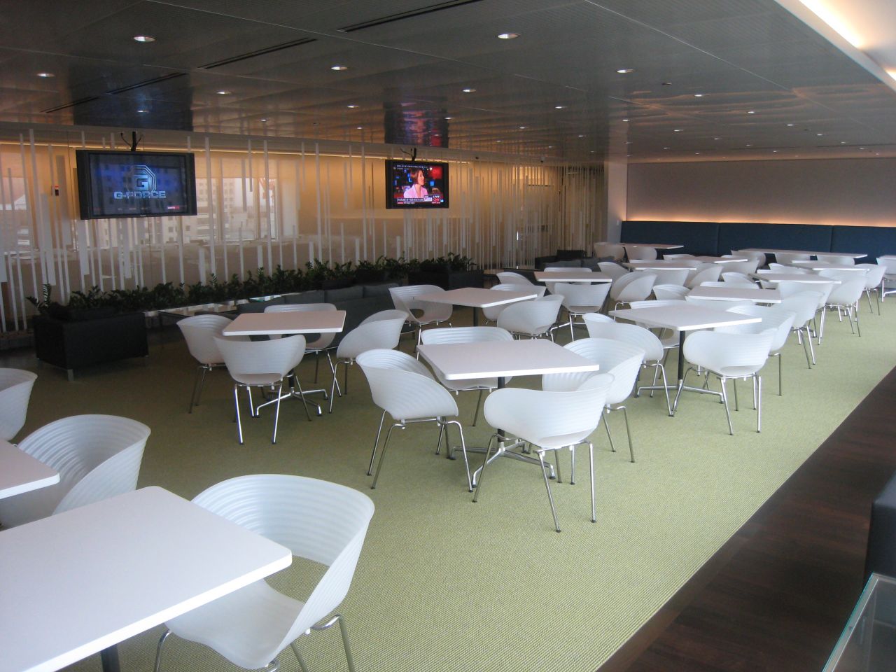 The 24th-floor employee cafeteria features two large-flat screen TVs and river views.