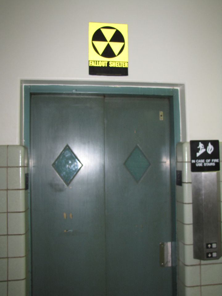 A relic of the Cold War still hangs over the elevator.