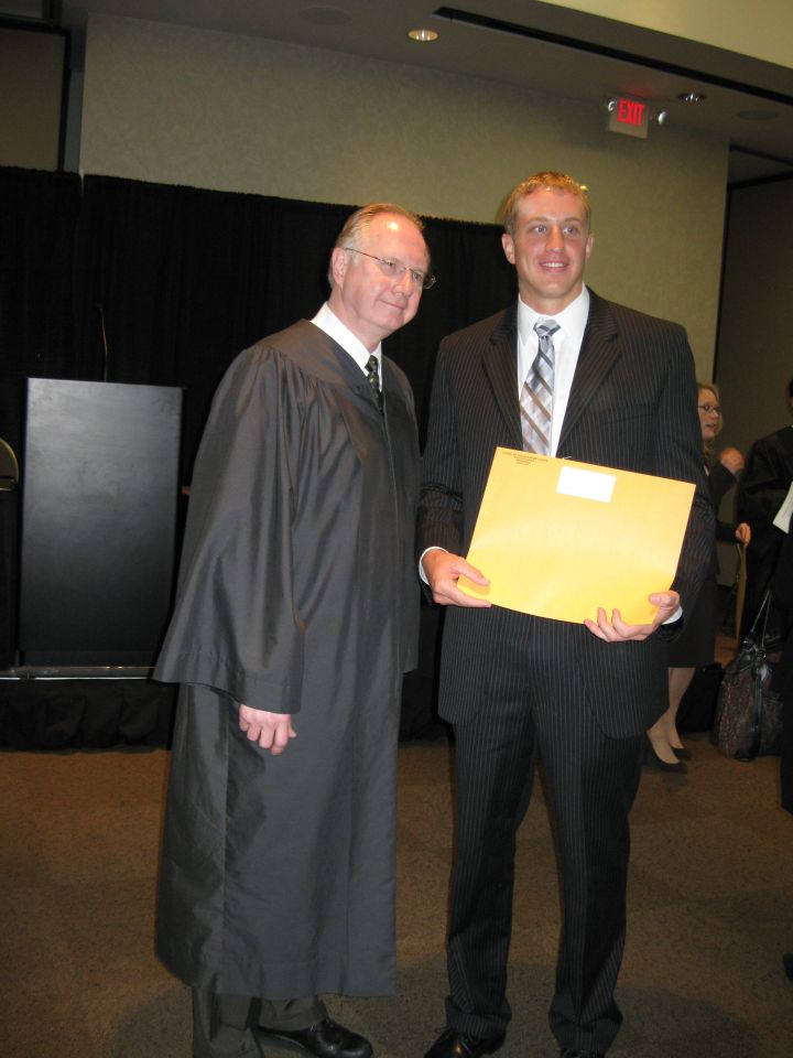 Justice Thomas L. Kilbride and new admittee Matthew Petersen