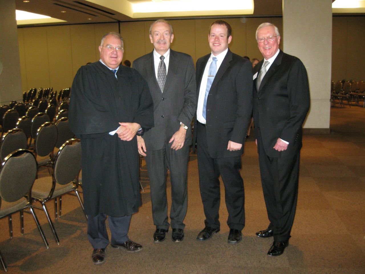 Justice Robert L. Carter, ISBA member Mark McGrath, his son, new admittee Patrick McGrath and ISBA President John O'Brien