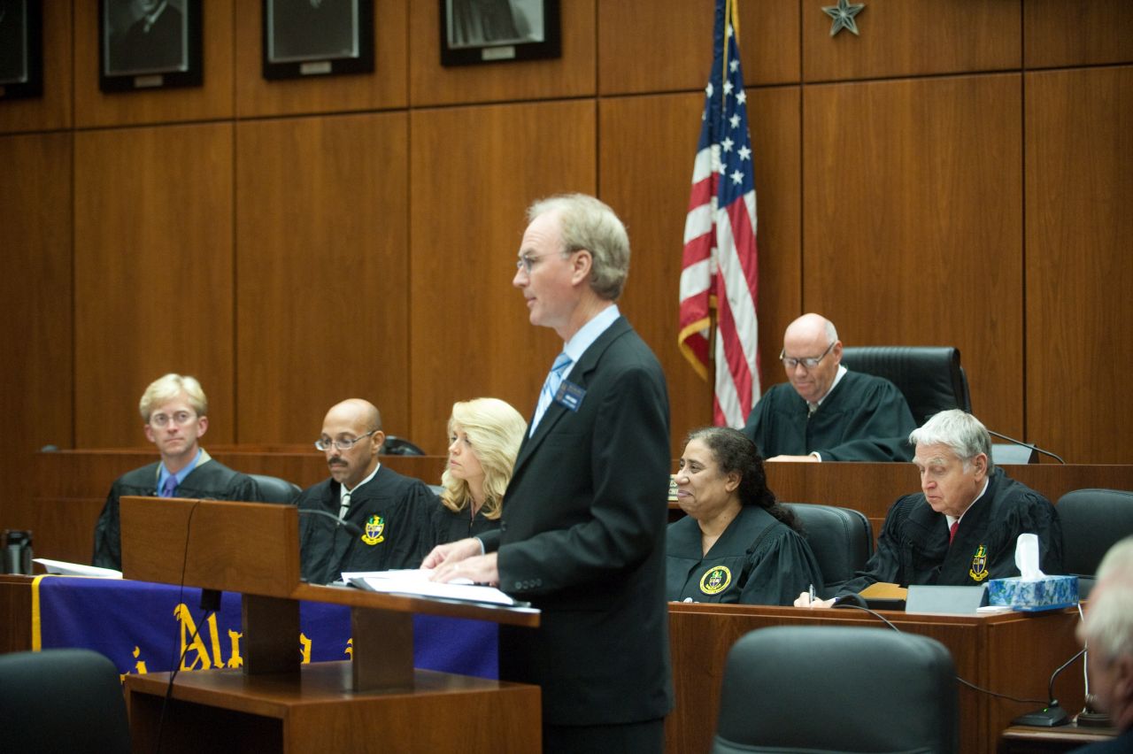 District XI Justice John K. Norris addresses the initiates during the ceremony.