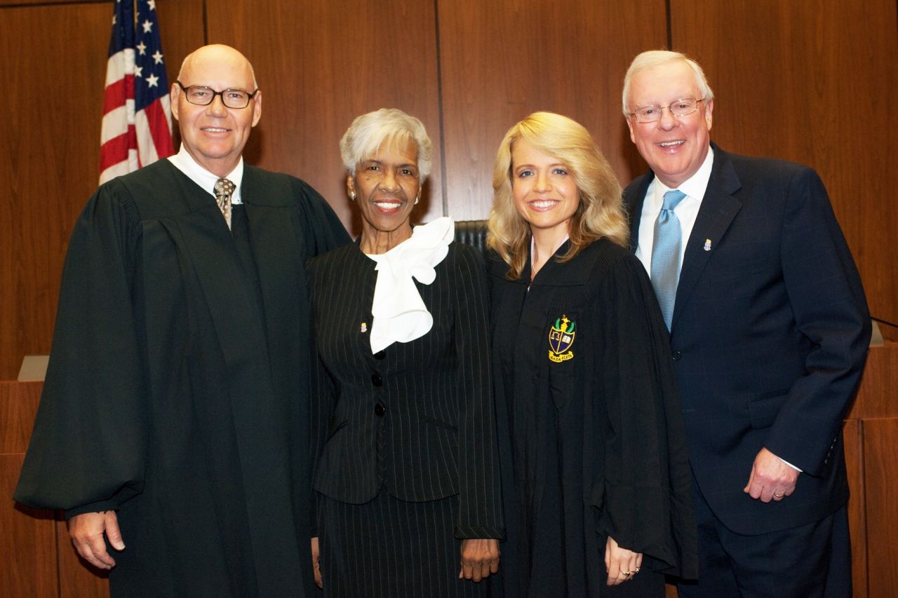 Chief Judge James F. Holderman (left) and Chapter Justice Michele M. Jochner (second from right), welcome two members of the new initiate class: Hon. Arnette R. Hubbard of the Circuit Court of Cook County, and John G. O'Brien, president of the Illinois State Bar Association.  