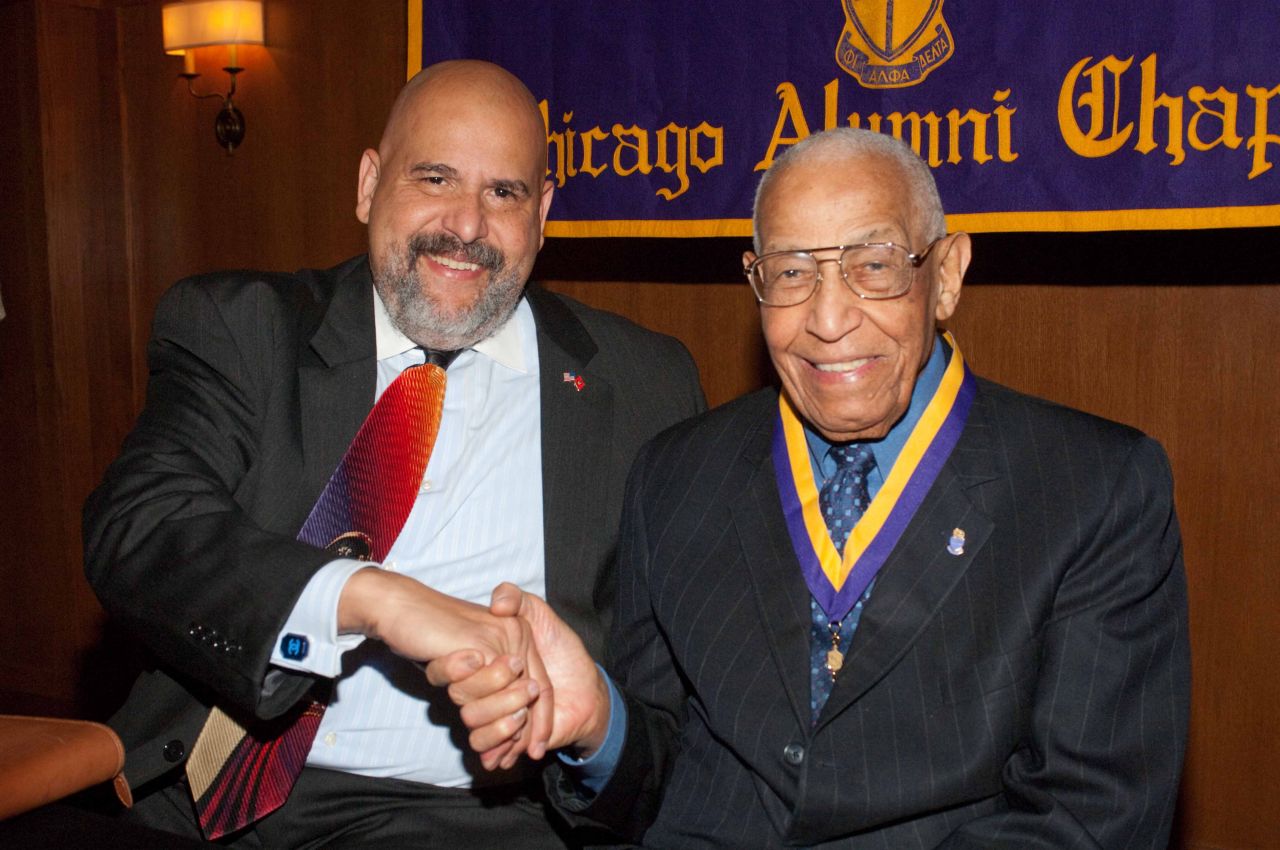 Judge William Hooks congratulates Judge Leighton.