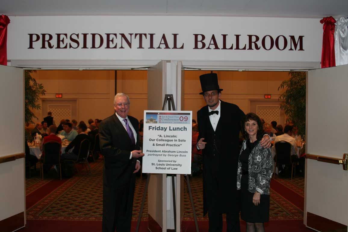 ISBA President, John O'Brien, George Buss (a.k.a. Abe Lincoln), and ISBA Director of Bar Services, Janet Sosin, pose for the camera before Friday's luncheon.