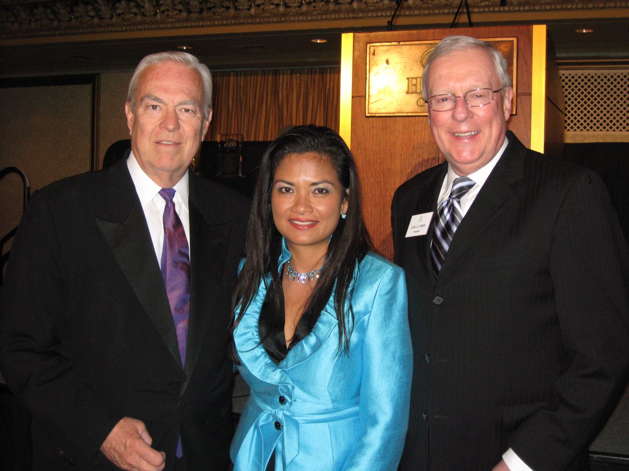 Unity Dinner Master of Ceremonies Bill Kurtis, Unity Dinner Chair Jessica Arong O'Brien and ISBA President John O'Brien