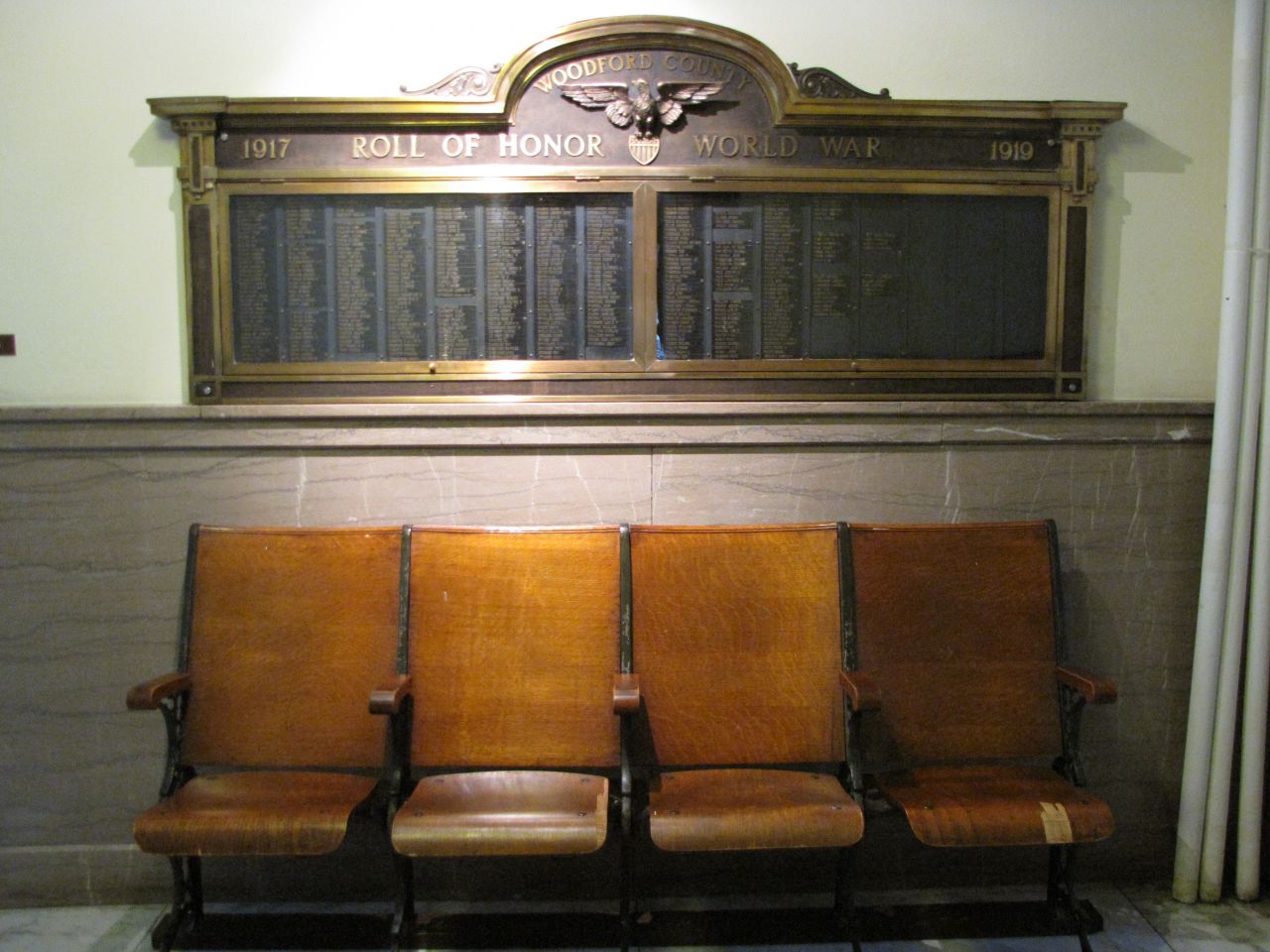 World War II memorial and antique benched on first floor