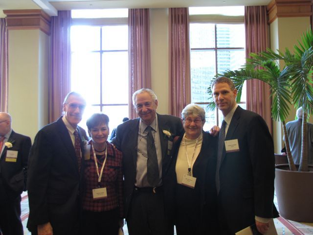 Distinguished Counsellors Howard Goffen (right) and Milton Jacobson (center) with their families