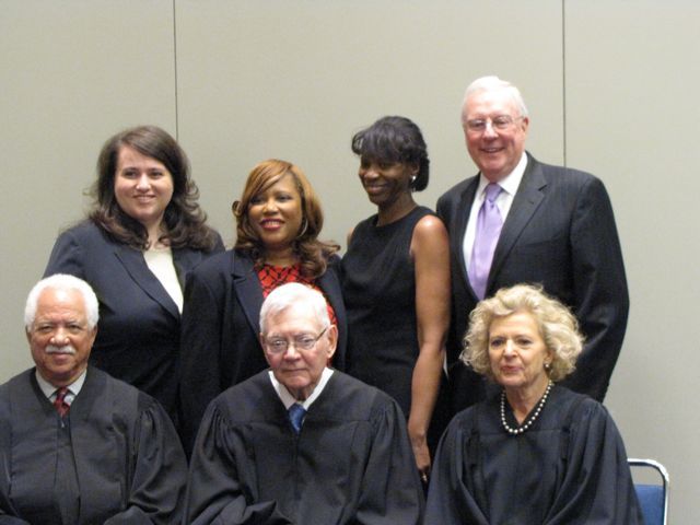 Illinois Supreme Court Justices Charles Freeman, Thomas Fitzgerald, Anne Burke and (rear) Justinian Society President Christina Mungai, WBAI President Patrice Ball-Reed, Cook County Bar Association President Marian E. Perkins and ISBA President John O'Brien