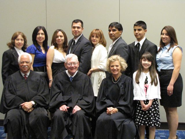 New admittee David Froylan and family with the justices.