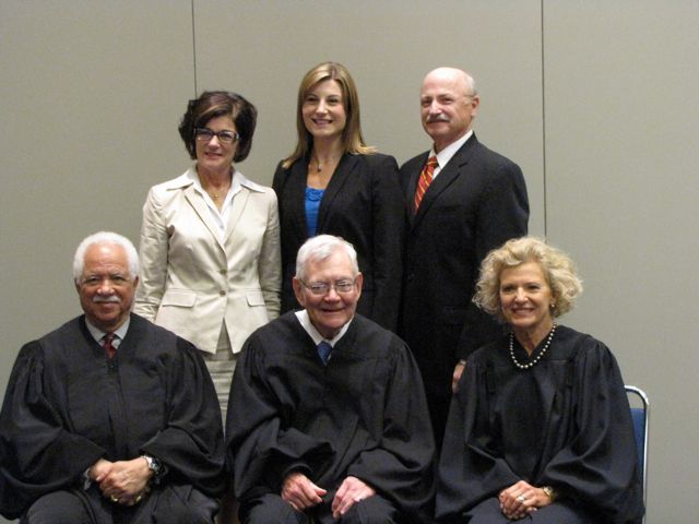 New admittee Colleen DeRosa and family with the justices.