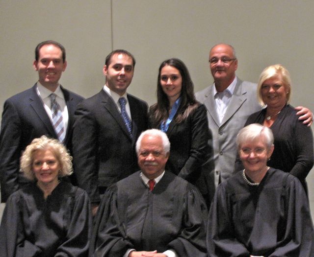 New admittee James Stathopolous with his family and the justices.