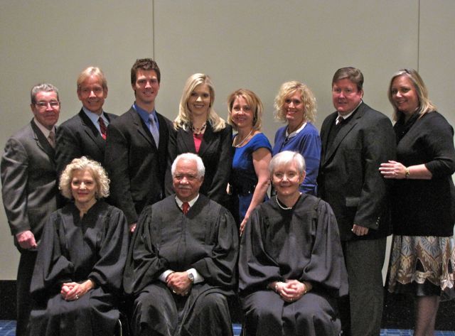 New admittee Shauna Martin with her family and the justices.