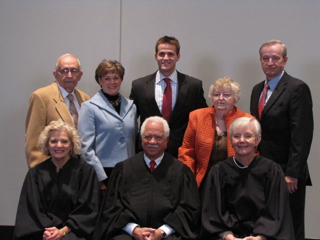 New admittee Kevin Sterk with his family and the justices.