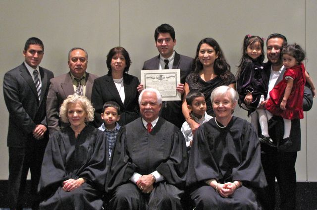 New admittee Leonardo Morales with his family and the justices.