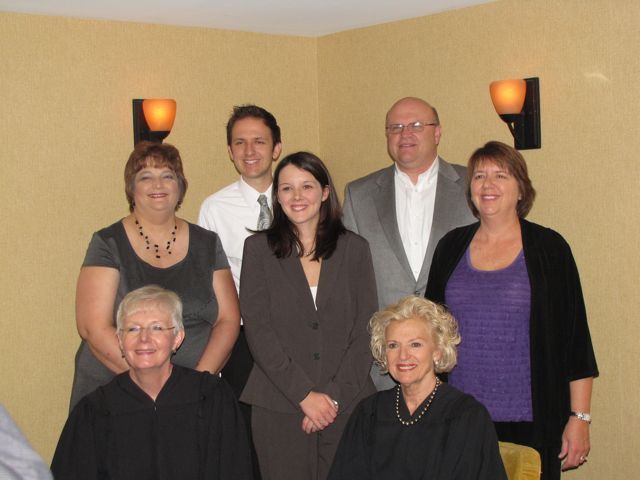 New admittee Emily Adams with her family and Justices Theis and Burke