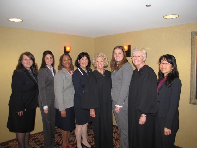 Representatives from local bar associations with Supreme Court Justices Anne Burke and Mary Jane Theis