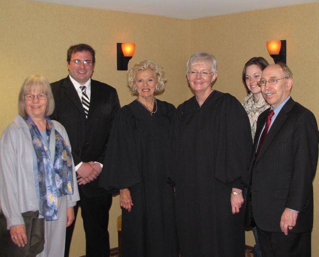 New admittee  Mike Welsh-Phillips with his family and Justices Burke and Theis