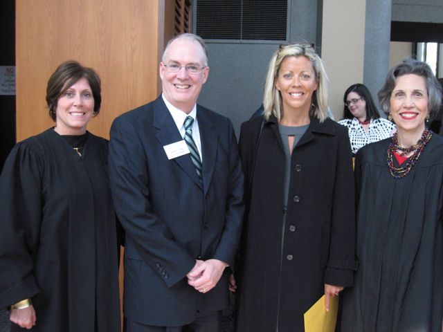 Justice Mary S. Schostock, ISBA 3rd Vice President Thies, new admittee Julie Brady of St. Charles, Justice Kathryn E. Zenoff 