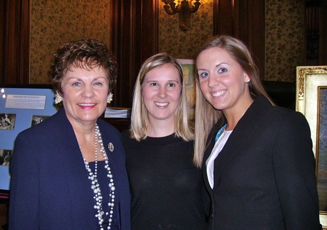 Illinois Supreme Court Justice Rita Garman with new admittees Meredith Fahrner and Cara Pratt