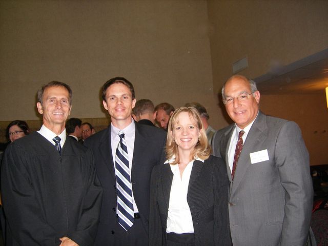 Judge Mark Shaner (from left) with new admittees Eric Bronner and Kay Parish, and ISBA President Hassakis