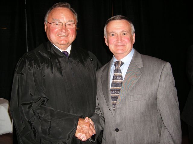  New admittee Thomas Mathews of Lee Summit, MO with Justice Karmeier.  Not only is Mr. Mathews a new lawyer, he is also a Doctor of Osteopathic Medicine.