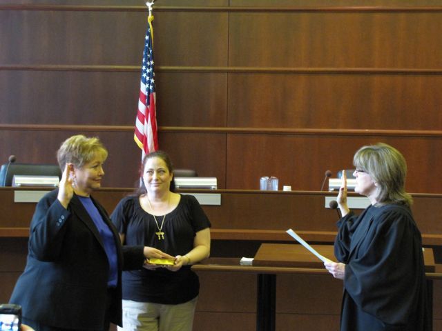 Andrea Schleifer is sworn-in by Judge Sheila O'Brien