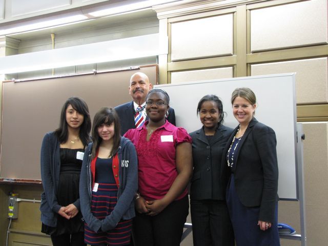 Essay winners with organizers of the Cook County Law Day event on May 3 at John Marshall Law School. From left: Gisel Bahena, 2nd place essay winner; Ashley Castaneda, 3rd place essay winner; Judge William Hooks, keynote speaker; Taelar Chatman, 1st place essay winner; event organizer Kenya Jenkins-Wright of Greene and Letts and event sponsor Rebecca E. Cahan of Avery Camarlingo Kill LLC.