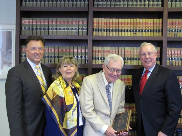 ISBA Immediate Past President John O'Brien presents a Board of Governors Award to Chief Justice Thomas Fitzgerald as ISBA President-elect John Locallo (left) and ISBA 3rd Vice President Paula Holderman look on.