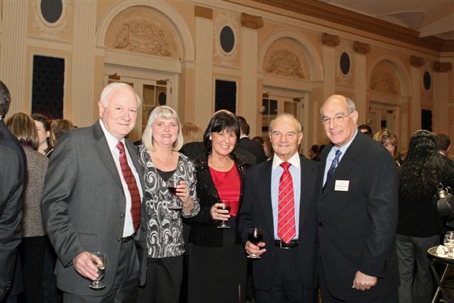 ISBA President-elect Mark Hassakis (far right) enjoys the dinner with (from left) Art Kingery of Kingery, Durree, Wakeman & Ryan, with his wife Sue, Ann Haas and Gary Rafool of Rafool, Bourne & Shelby