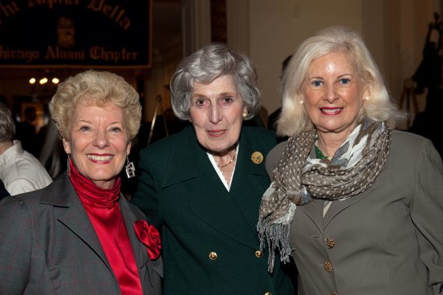 Past ISBA President Hon. Carole K. Bellows and Hon. Rhoda Davis Sweeney congratulate Justice McMorrow.