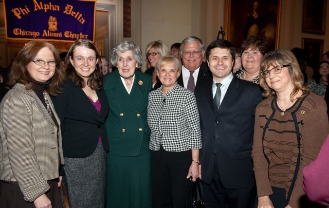 Justice McMorrow is congratulated by members of the Advocates Society.