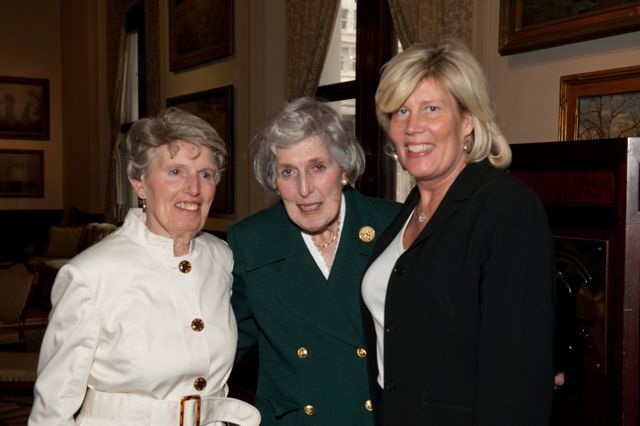 Justice McMorrow is congratulated by her sister, Frances Grohwin, and her daughter, Dr. Mary Ann McMorrow.