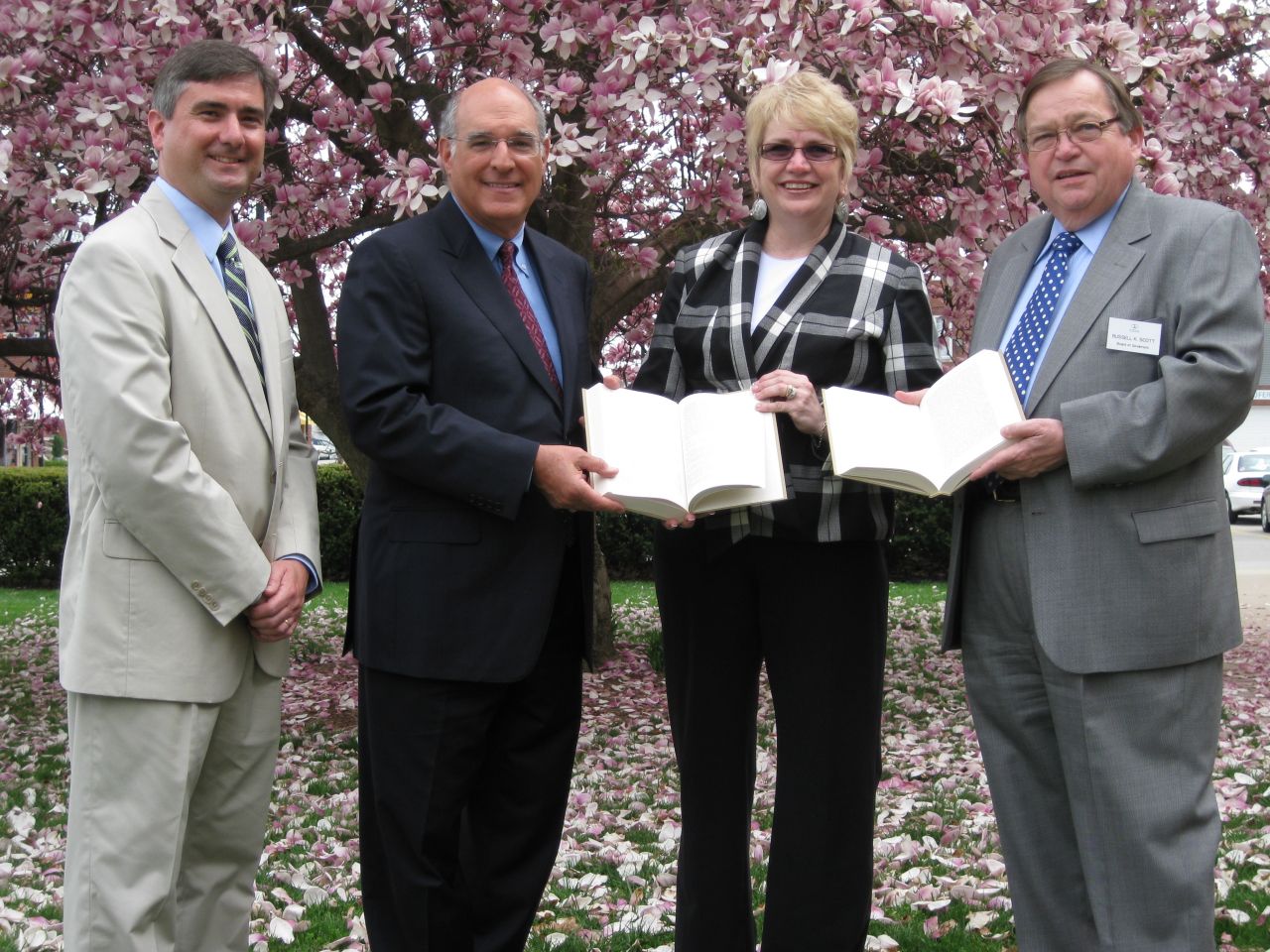 ISBA President-elect Mark Hassakis (second from left) presented The Papers of Abraham Lincoln to the Collinsville Public Library on April 5. Accepting the books is Barbara Rhodes (second from right), library director. On hand for the presentation were Chris Bauer of Greenville (left), chair of the ISBA