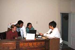 Circuit Clerk Cathy Oliveri prepares court personnel for their Mock Trial roles