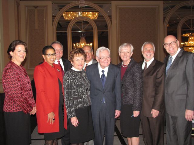 (Click to enlarge) First row from left: CBA President Terri Mascherin, Judge Ann Claire Williams, Justice Rita Garmin, Chief Justice Fitzgerald, Justice Mary Jane Theis, Justice Bob Thomas, Chief Judge James Holderman. Back row: Justice Lloyd Karmeier, ISBA President Mark Hassakis
