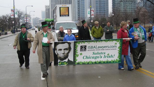 Participants march down Columbus Drive