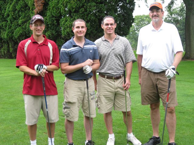 A foursome from Hinshaw Culbertson includes Jerry Barenbaum, Michael Iasparro, Matthew Hevrin and Jeff Spears